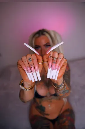 OnlyFans cuenta spicytattoodoll header 2
